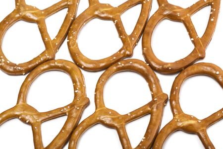 Salted pretzels on white backgroundの写真素材