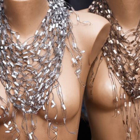 Mannequins with scarf necklace at market in Turkeyの写真素材