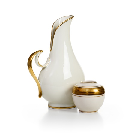 Two old white porcelain vases on white backgroundの写真素材