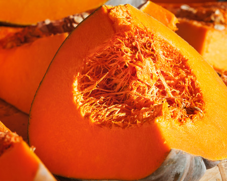 Fresh ripe pumpkin slices at a farmers marketの写真素材