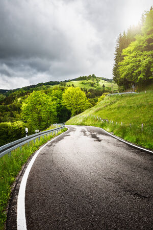 Road on the spring hills landscape. Black Forest Schwarzwald in Germanyの写真素材