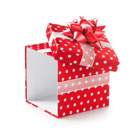 Open red gift box with white dots and ribbon bow. Holiday present. Object isolated on white...
