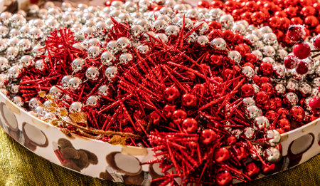 Many christmas garlands piled up in a basket. Close up. Selective focus. Christmas decoration...