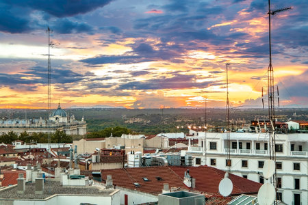 Rooftops of Madrid. Aerial View Of The Old Town Against Cloudy Skyの写真素材