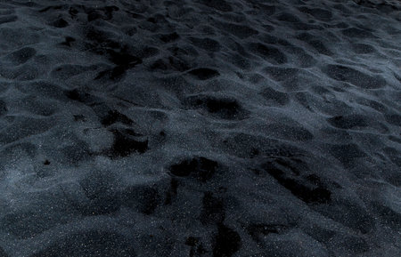 detail of black beach sand, volcanic in origin. Texture background. Close upの写真素材