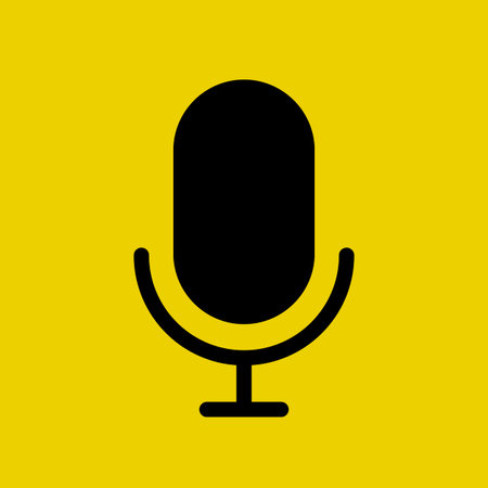 A simple flat 2D microphone icon with a yellow background. The microphone is black and has a yellow border. Symbol of communication, podcast or audio recordingのイラスト素材
