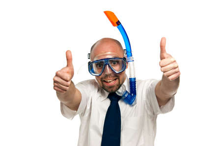 Businessman isolated on a white background wearing a snorkel and maskの写真素材