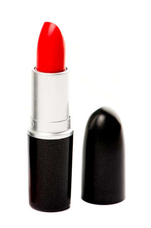Red lipstick and lid isolated on a white backgroundの写真素材