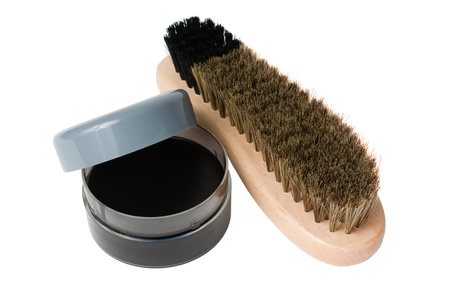 Wooden shoe brush and cream isolated on white backgroundの写真素材