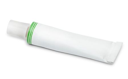 Closed tube of ointment or cream isolated on white backgroundの写真素材