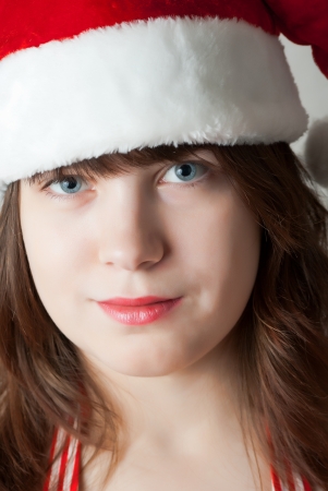 Portrait of girl in cap Santa Clausの写真素材