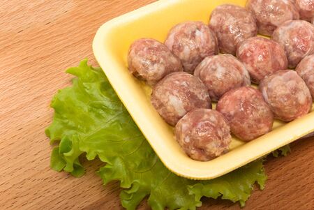Meatballs made of chicken meat on the trayの写真素材