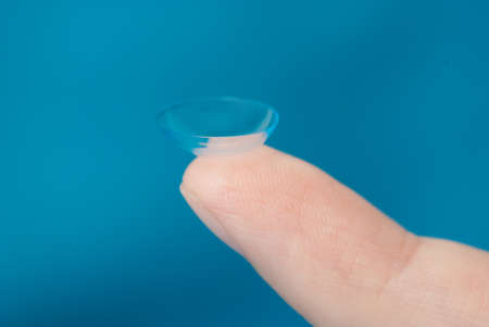 Contact lens on the tip of your fingerの写真素材