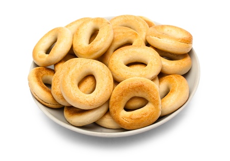 Saucer with baranki isolated on white backgroundの写真素材