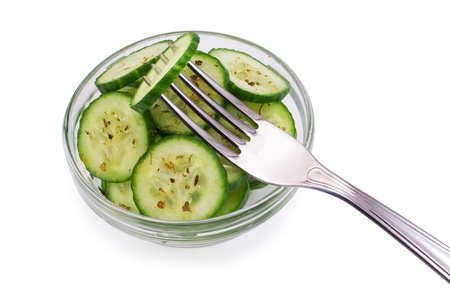 Salad fom cucumbers isolated on white backgroundの写真素材
