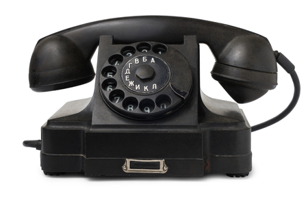 Old desktop telephone isolated on white backgroundの写真素材