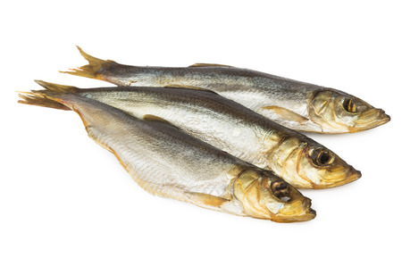 Three smoked herring isolated on white backgroundの写真素材