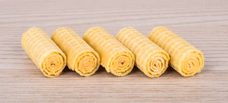 More wafer rolls in row on table