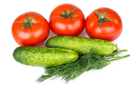 Tomatoes cucumbers and dill isolated on white backgroundの写真素材