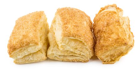 Three flaky biscuits isolated on white backgroundの写真素材