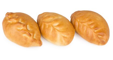 Row of three small baked pie isolated on white backgroundの写真素材
