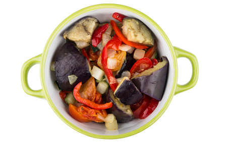 Roasted vegetable mix in green bowl isolated on white background, top viewの写真素材