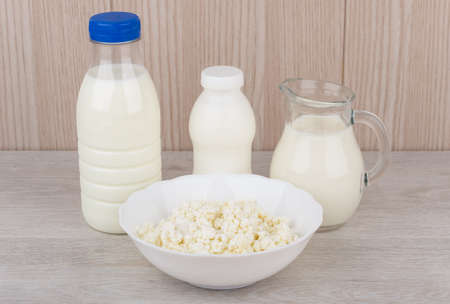 Different dietary dairy products on wooden table