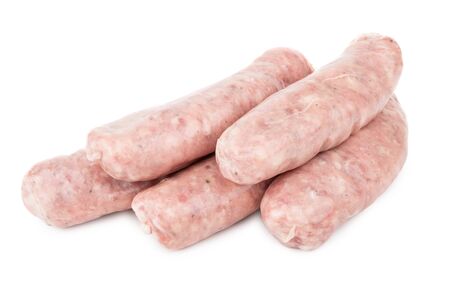 Heap of raw pork sausages isolated on white backgroundの写真素材