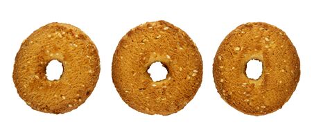 Three shortbread rings with sesame isolated on white background. Top view