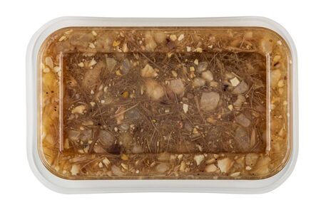 Meat jelly in transparent plastic box isolated on white background. Top view