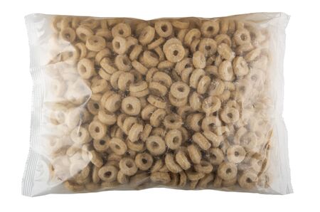 Transparent plastic pack with corn rings isolated on white background
