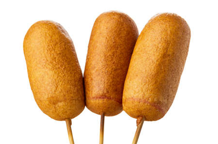 Three fried sausages on bamboo skewers isolated on white backgroundの写真素材