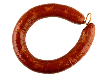 Smoked sausage ring isolated on white background. Top view