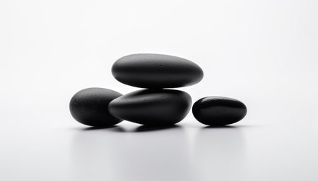 Spa stones on a white background. Zen and relaxation concept.の素材