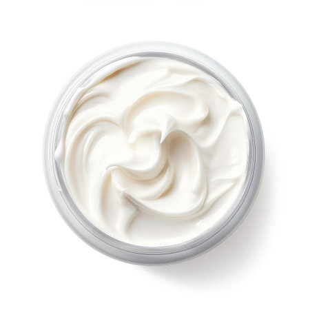 Creamy cosmetic cream in jar isolated on white background. Top view. blank cosmetic packaging, mock upの素材