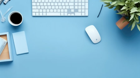 Blue office desk table with computer, supplies and coffee cup. Top view with copy spaceの素材