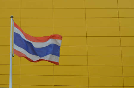 Thai Flag on the yellow backgroundの写真素材