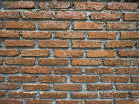 Vintage worn brick wall background or textureの写真素材