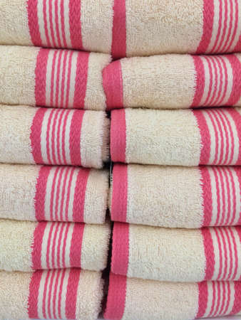 Stack of bright colorful towelsの写真素材