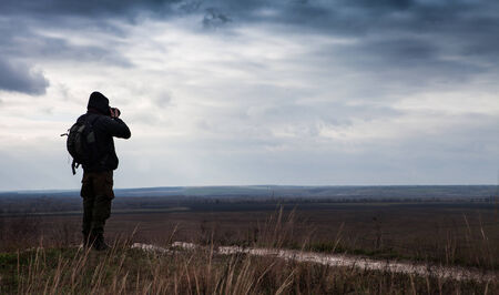 Alone nature Photographer shoots the landscape