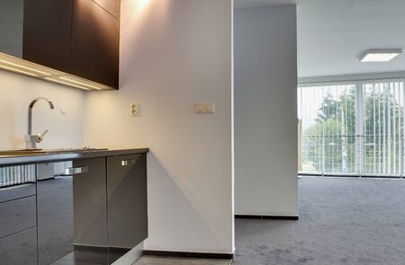 ZILINA , SLOVAK REPUBLIC - OCTOBER 01, 2015: Modern kitchen in Living room apartment, Zilina in Slovac Republic on Oct. 1, 2015.のeditorial素材