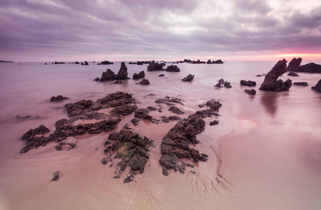 Morning Low tide. Sunrise sand beach near the Noja town, Cantabria, Northern Spainの写真素材