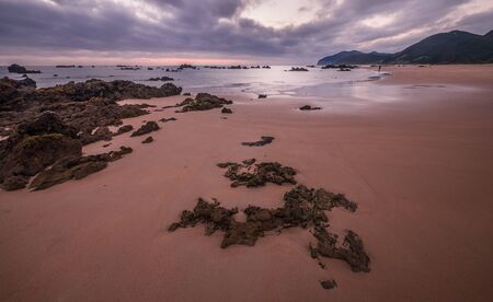 Morning Low tide. Sunrise sand beach near the Noja town, Cantabria, Northern Spaの写真素材