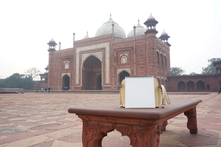 An empty note to type in a text to express any feeling with the Red Sandstone Mosque of Taj Mahal, India, as a background.のeditorial素材
