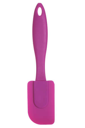 Pink kitchen silicone trowel isolated on white background without shadowの写真素材