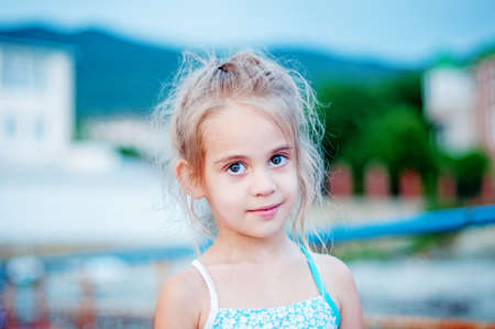 Happy cute little girl on beachの写真素材