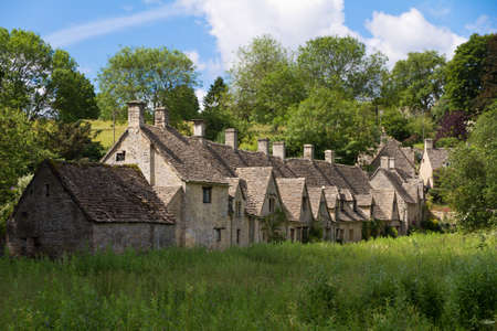 Arlington Row in Bibury with River Coln, Cotswolds, Gloucestershire, UKのeditorial素材