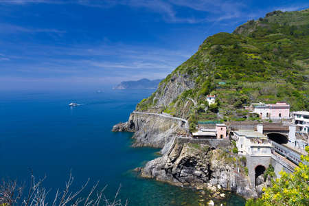 Coastline at Riomaggiore and railway station, Cinque Terre, Italy