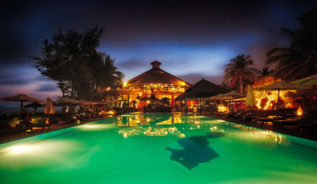 Seaside resort with pool at a dusk,Phan Thiet, Vietnamのeditorial素材