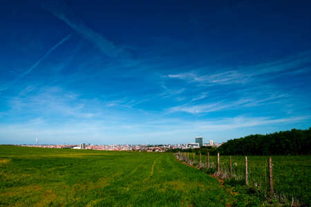 Landscape with blue sky and city of Prague in a distanceの写真素材